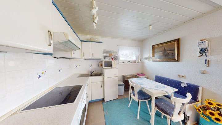 Eigentumsgrundstück mit Ferienbungalow mit Wasserblick in Drigge auf der Insel Rügen